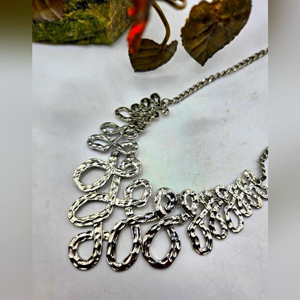 "5/$25" Silvertone Swirl Bib Adjustable Statement Necklace